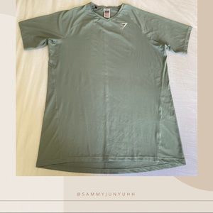 Mens Gymshark performance lightweight blue shirt.